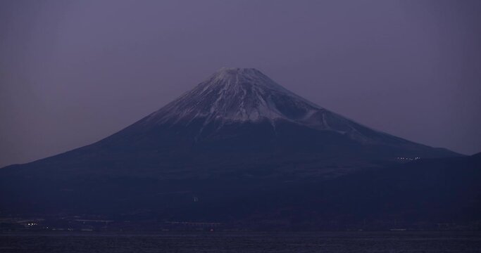 A dusk of Mt.Fuji behind the blue sky in winter Generative AI