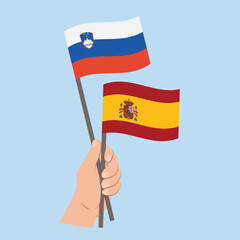 Flags of Slovenia and Spain, Hand Holding flags