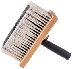 natural paint brush on a white background with a wooden handle