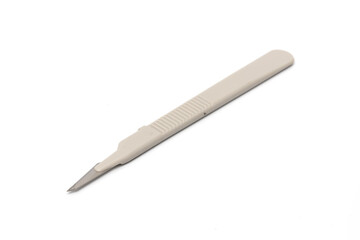 Disposable surgical scalpel isolated on white