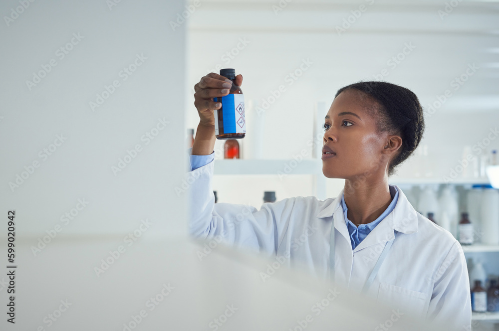 Poster This will change everything. a young scientist working in a lab.