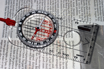 Compass on a newspaper