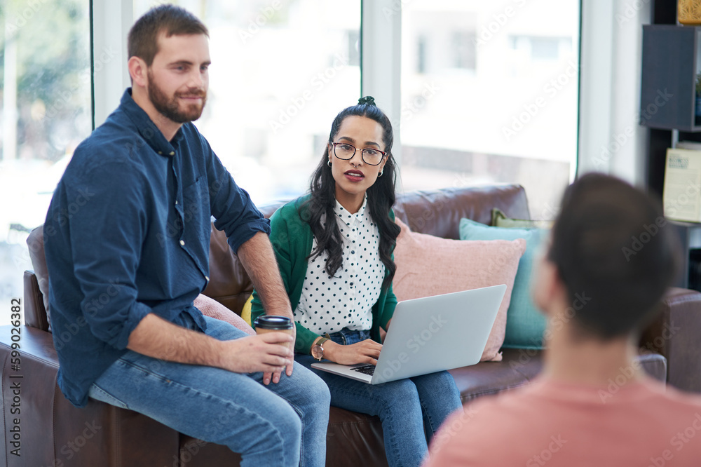 Poster web developers doing what they do best. a group of young businesspeople having a meeting in a modern