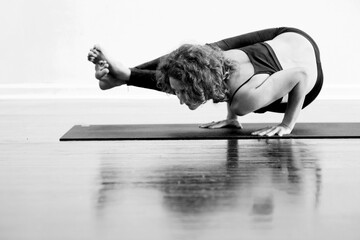 Woman practicing yoga.