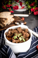 Beef meat stew in ceramic pot.