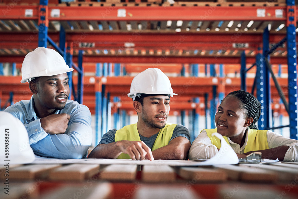 Poster Lets get it done and get it done safely. a group of builders having a meeting at a construction site.