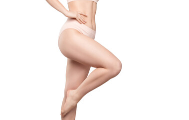 A slender swarthy woman in beige underwear on a white background. Healthy lifestyle, sport and diet.