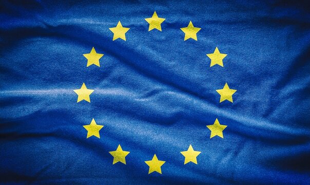 Concept of the fabric flag of the European Union. Flag of European Union painted on cotton fabric. © shadowmoon30