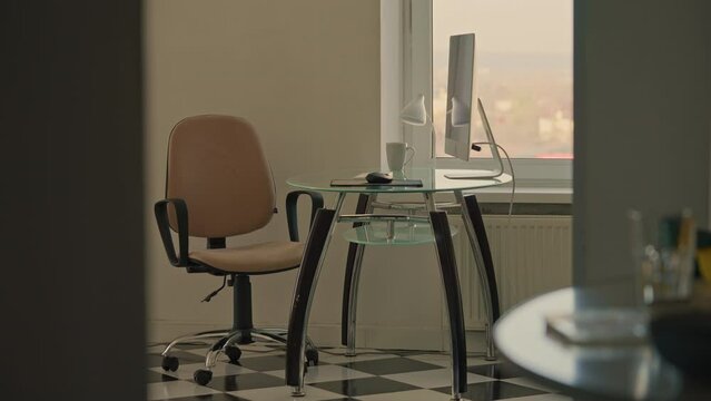 woman enter into the room sit down at the workplace workday at home office freelancer using computer Generative AI