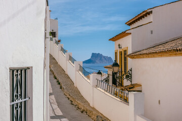 Altea old town with narrow streets and whitewashed houses. Architecture in small picturesque village of Altea near Mediterranean sea in Alicante province, Valencian Community, Spain
