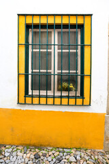 Typical Portuguese facade with colorful window
