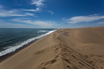 Photo of Walvis bay where sand of Namib meet the sea