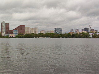 Naklejka premium May rain over the metropolis