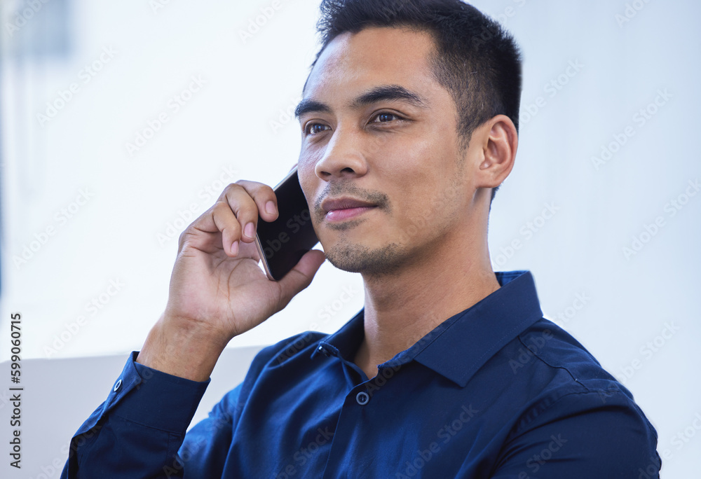 Poster reach out to your network if you need some help. a young businessman talking on a cellphone in an of