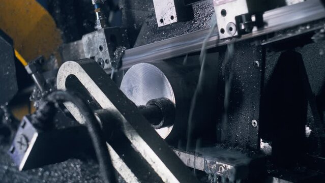Close up shot of professional machine cutting steel pipe and using the coolant liquid. Process of work band saw for industrial cutting on factory. Concept of manufacturing, production Generative AI