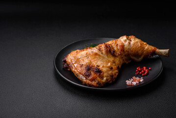 Fresh grilled chicken leg with salt, spices and herbs