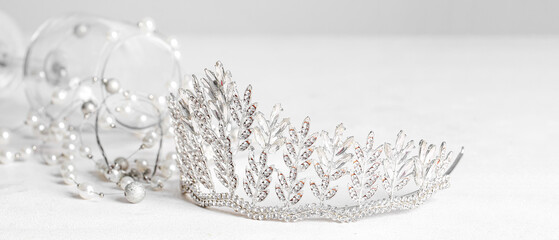 Beautiful crown and necklace on light background. Prom concept © Pixel-Shot