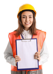 Female engineer with clipboard on white background
