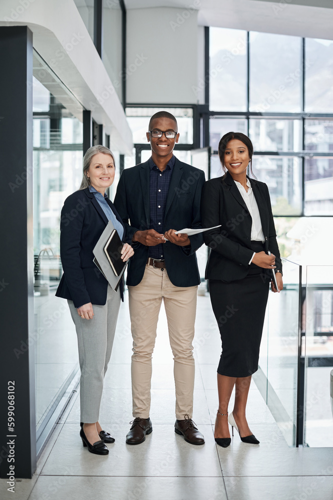Poster winning is possible and it all starts with the team. portrait of a group of businesspeople working t