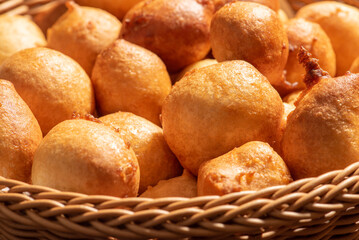 Raincake, closeup details of a basket with raincakes on rustic wood, selective focus.
