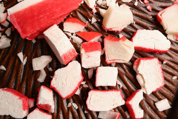 Tasty cut crab sticks on plate, closeup © Pixel-Shot