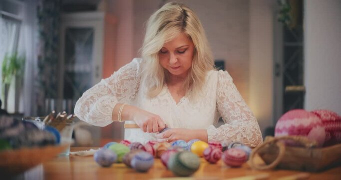 Woman decorating Traditional Easter Eggs Using Old Traditional Technique. Generative AI
