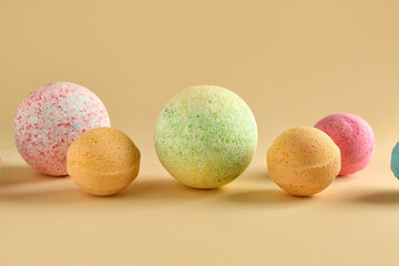 Bath bombs on beige background