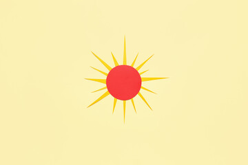Bright paper sun on yellow background