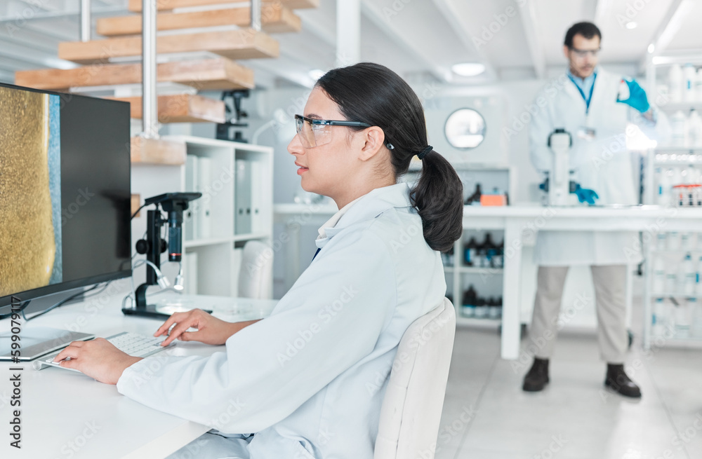 Sticker Constantly questioning, analysing and experimenting. a young scientist working on a computer in a lab.