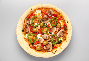 Vegetable pizza on grey background