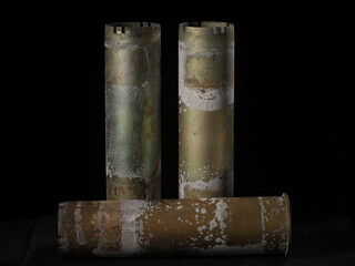 Used flak shells in dramatic composition