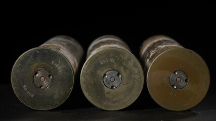 Front view of three anti-aircraft gun shells