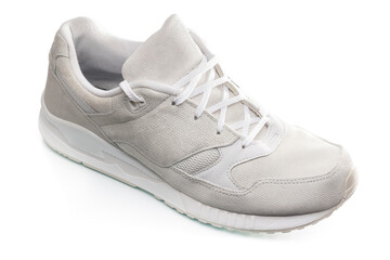 White sneakers natural suede isolated on white background