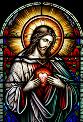 Obraz premium Merciful Jesus with a heart in the style of a church stained glass window, generative AI
