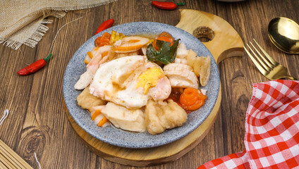 Seblak is a typical Sundanese dish with a savory and spicy taste. Made from wet crackers cooked.