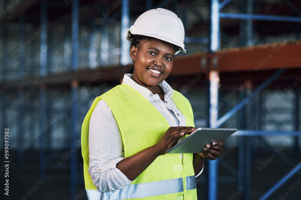 Poster An easy connection between site and client. a builder using a digital tablet while working at a construction site.