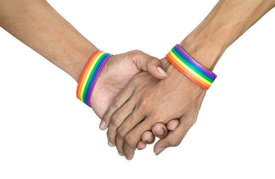 Close-up of two gay man holding hands with rainbow colored wristband on wrist isolated on white background with clipping path