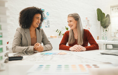 Team of designers working together. Happy colleagues collaborate in a meeting. Team of designers...
