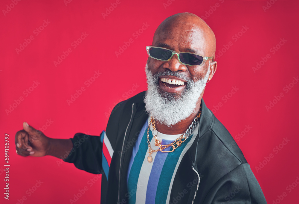 Aufkleber im feeling good. studio shot of a senior man wearing retro attire while posing against a red backgro