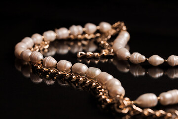 Pearl necklace isolated on black background