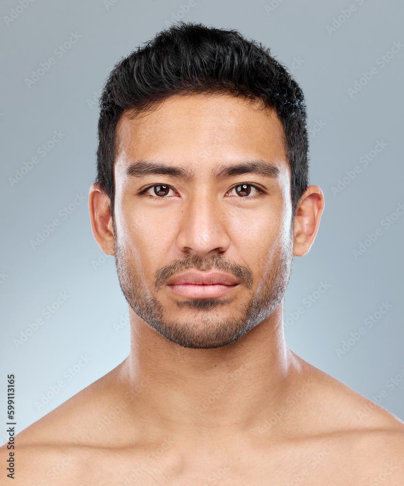 Sticker How much do you care about your appearance. Closeup shot of a handsome young man posing against a grey background.