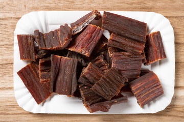 top view beef jerky on wood background