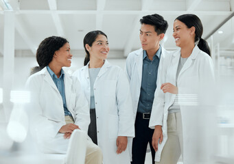 Happiness can be scientifically crafted. a happy team of scientists together in their lab.