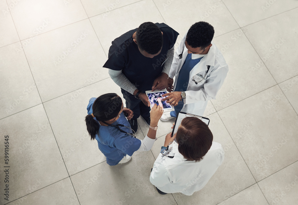 Poster we need to have a quick meeting. a group of doctors and nurses using a digital tablet during their m