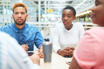 Theyve never met a deadline they didnt meet. a group of young businesspeople having a meeting in a modern office.