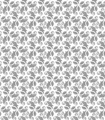 Floral ornament. Seamless abstract classic background with gray leaves. Pattern with gray repeating floral elements. Ornament for fabric, wallpaper and packaging