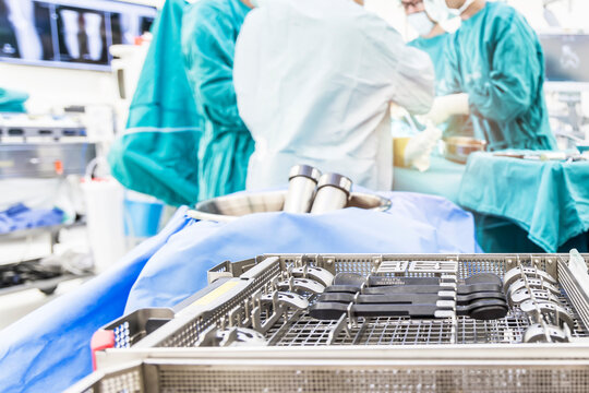 Medical total or unilateral knee joint replacement instrument tray inside operating room with blur background.A team of doctor or surgeons did arthroplasty surgery technology.Medical and orthopedic.