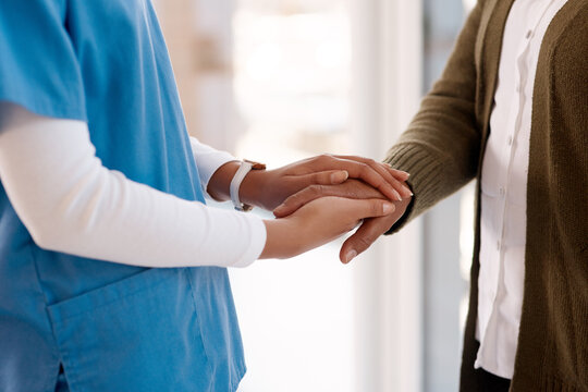 Kindness And Compassion Go A Long Way. Closeup Shot Of An Unrecognisable Nurse Holding A Senior Womans Hand.