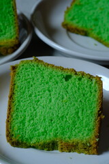 Bolu Pandan or Pandan sponge cake or chiffon cake, is Asian take on Western sponge cake in marble