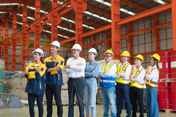 Project manager and engineer Groups diversity factory workers standing and take a selfie happy and cheerful at industrial manufacturing factory.